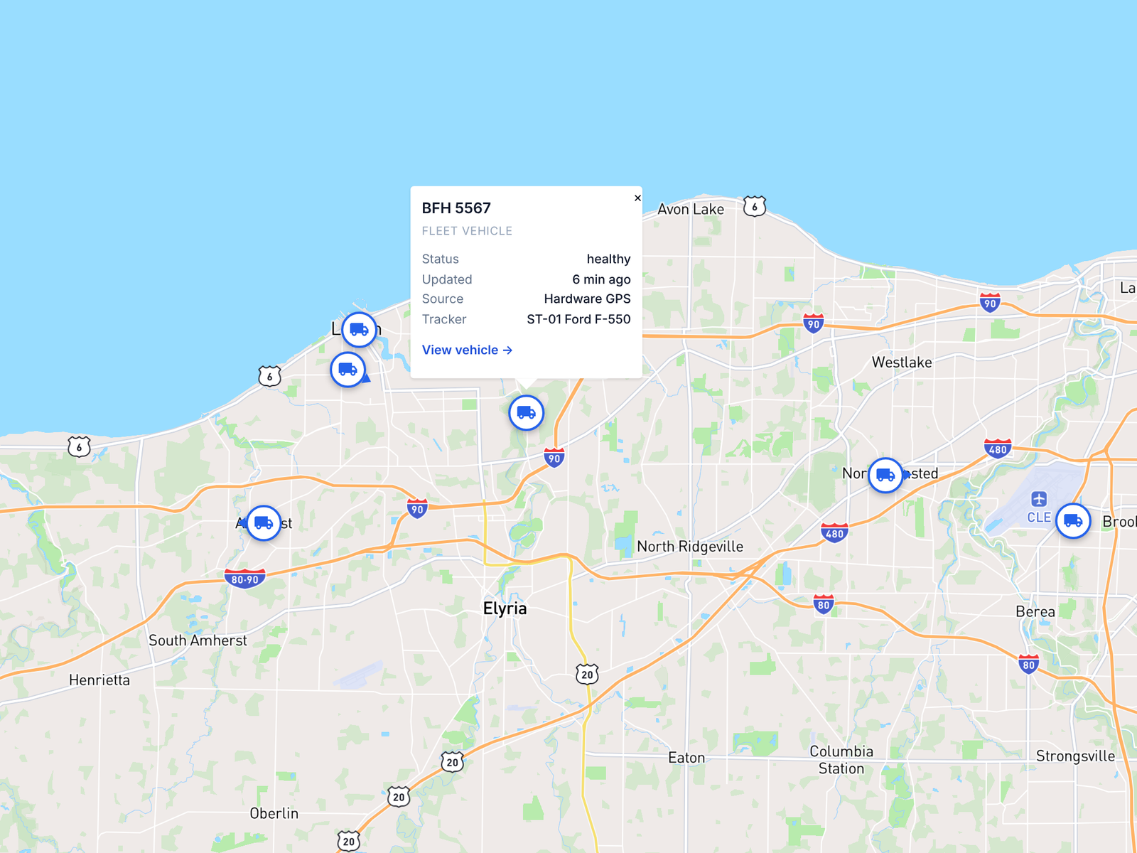 The PortaPro dispatch map with trucks moving along their routes, each pin labeled Hardware GPS.